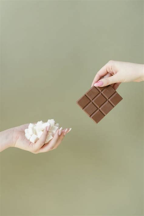 People Holding Chocolates · Free Stock Photo