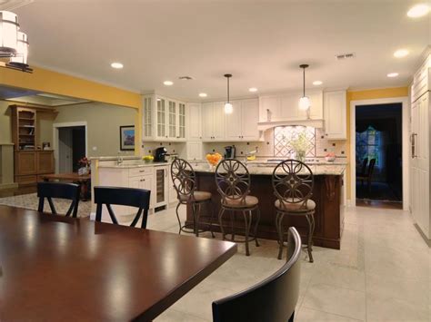 Yellow Transitional Kitchen With Wood Island And White Cabinets Hgtv