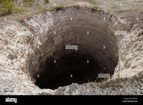 Round Karst Sinkhole Formed Above Abandoned Limestone Mine Total