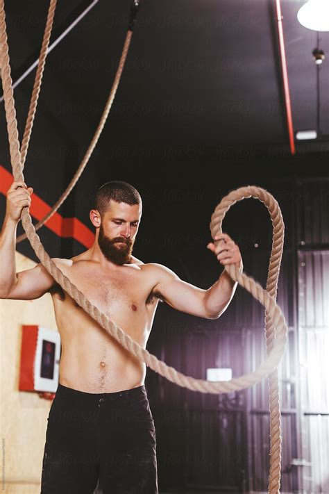 Portrait Of A Man With A Climbing Rope In A Gym Box By Stocksy