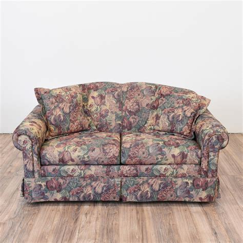 This Loveseat Is Upholstered In A Durable Floral Print Fabric In A Dark