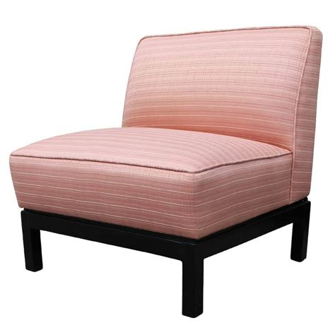 A pink accent chair or a yellow accent chair brightens up any room that is decorated with mostly dark colors in it. Pair of Clean Lined Modern Slipper Chairs in Light Pink with Deep Walnut Bases at 1stdibs