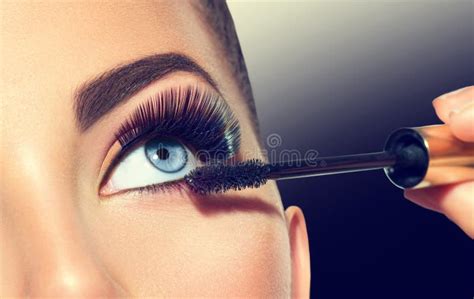 Long Lashes Closeup Beautiful Woman Applying Mascara On Her Eyes Stock