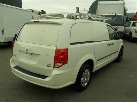 2012 Dodge Caravan Cargo Van With Shelving And Ladder Rack Outside