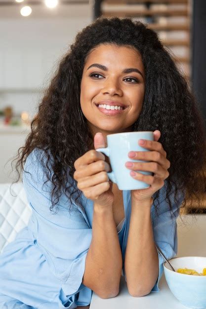 Free Photo Young Woman Having A Cup Of Coffee