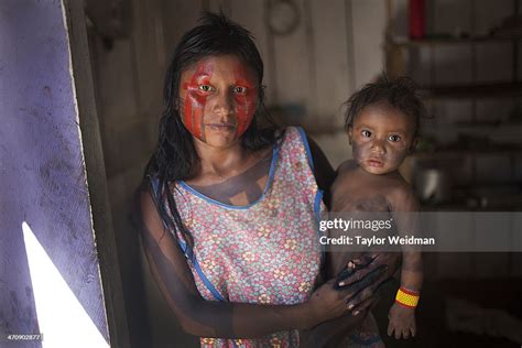 Nhakri A Xikrin Woman In The Village Of Poti Kro Stands For A News