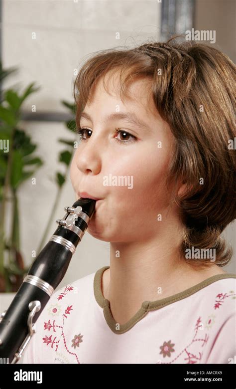 Girl Playing Clarinet Close Up Stock Photo Alamy