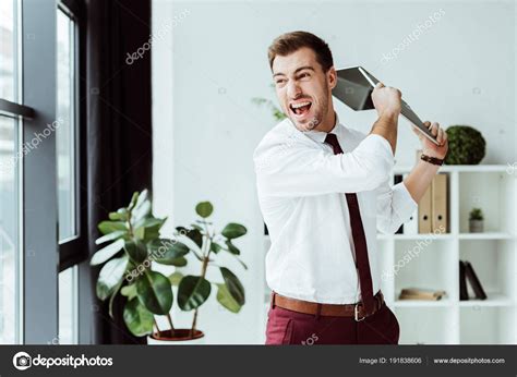 Aggressive Businessman Screaming Throwing Laptop Modern Office Stock