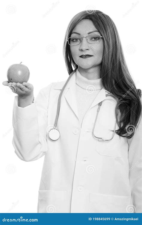 Studio Shot Of Woman Doctor Holding Apple Stock Image Image Of Person