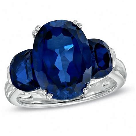 Oval Lab Created Blue Sapphire Three Stone Ring In Sterling Silver