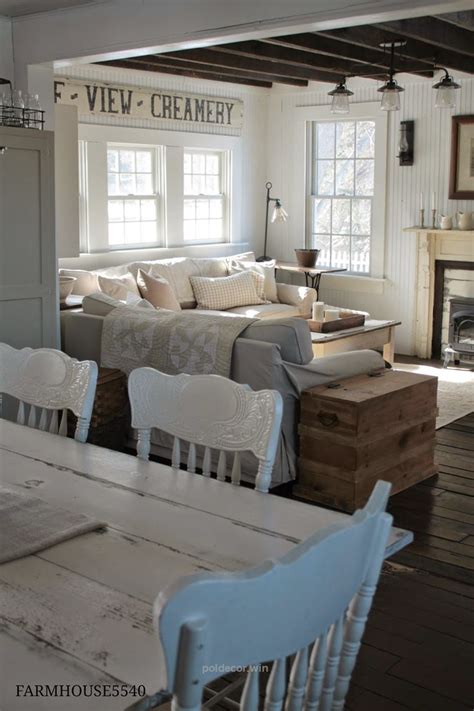 We love rustic living rooms and these farmhouse designs are rustic and incorporate antiques and country themes. FARMHOUSE 5540 love the painted chairs | Cottage living ...