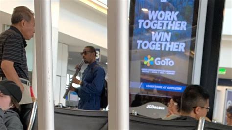 andré 3000 aimlessly walked around lax playing a double flute as only andré 3000 would blavity