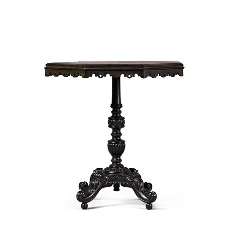 AN ANGLO-SINGHALESE EBONY AND SPECIMEN WOOD TABLE, PROBABLY GALLE ...