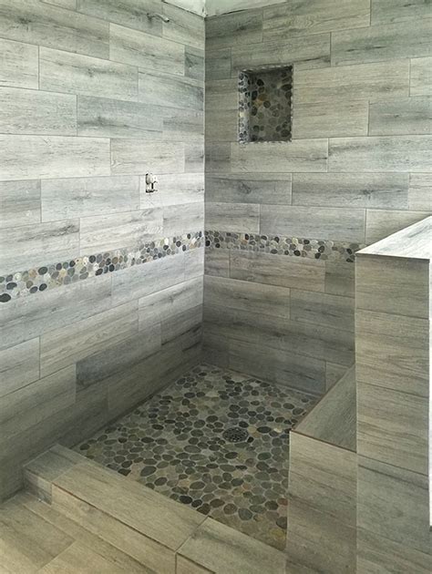Sliced Bali Ocean Pebble Tile Shower Floor With Accents Subway Tile