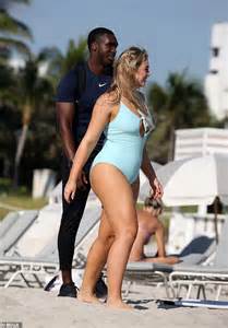 Iskra Lawrence Shares A Kiss With Mystery Male Companion On The Beach