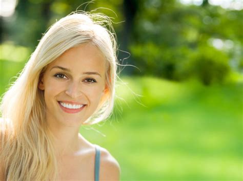 Smiling Young Beautiful Woman Outdoors — Stock Photo © Gstudio 9701296