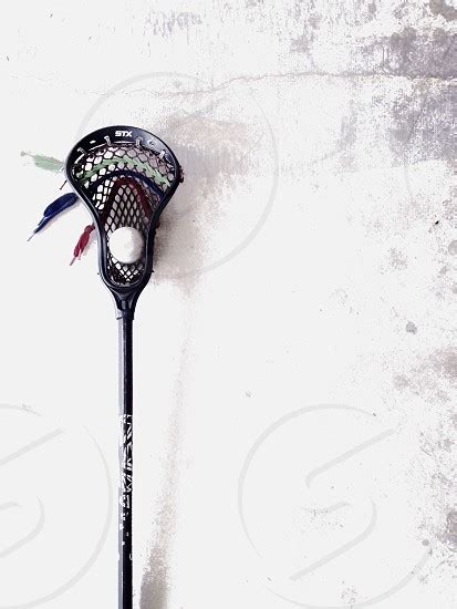 Black Lacrosse Racket By Jill Williams Photo Stock Studionow