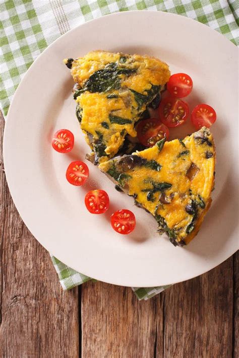 Sliced Frittata With Spinach Cheddar Cheese And Mushrooms Close Stock