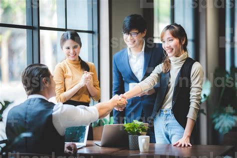 Business People Shaking Hands Finishing Up A Meeting Success Concept