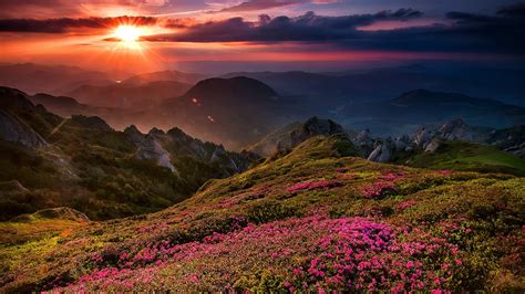 Sunset Over The Mountains Wallpaper Backiee