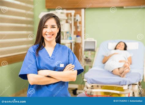 Cute Nurse Taking Care Of A Pregnant Patient Stock Photo Image Of
