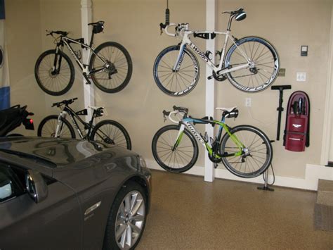 Smooth pulleys and latches make lifting even heavy bikes super easy. Creative Bike Rack Ideas for Homes - HomesFeed