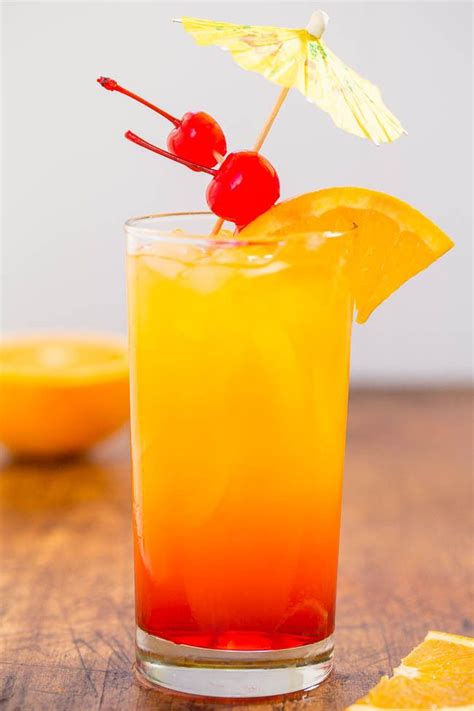 It's no secret we love margaritas, but there is so much more to do with tequila! Tequila Sunrise (Easy Tequila Mixed Drink!) | AverieCooks ...