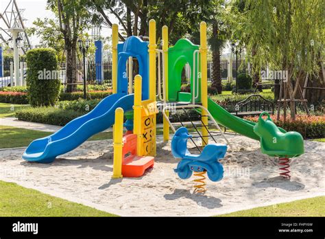 Colorful Playgrounds In Park Stock Photo Alamy