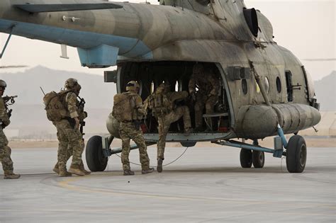 Australian Special Operations Task Group Soldiers Board An Afghan