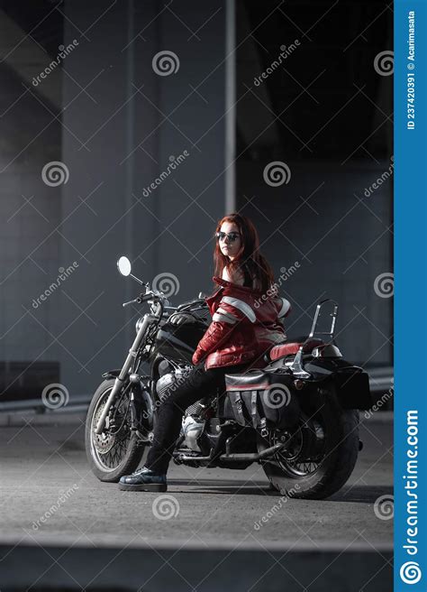 Girl Biker Sexually Posing On Motorcycle At Night City Stock Image