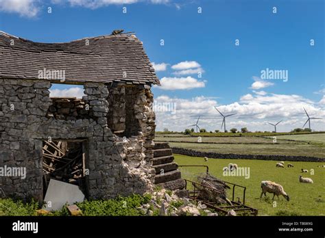 Old Stone Derelict Abandoned Barn Building In A Field Near To