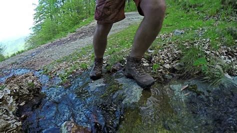 Foot Steps Of Hiker Hiking Outdoors Walking Feet On Rocky Terrain
