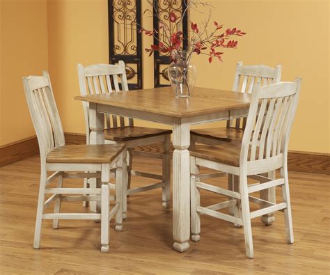 A round bistro table style is a small round table, with glass top and metal legs, although some are made of wood. Sanibel Set | Rustic pub table, Round pub table, Pub set