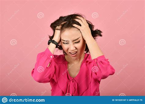 Angry Asian Woman Screaming Girl With Furious Aggressive Hand Gesture On Pink Background
