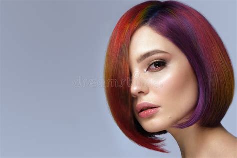 Beautiful Woman With Multi Colored Hair And Creative Make Up And