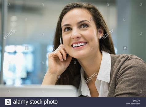 Businesswoman Smiling In Office Stockfoto Lizenzfreies Bild 64744710