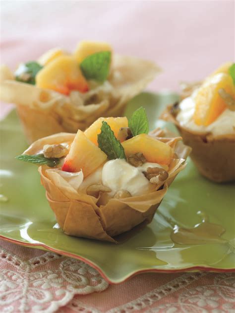 Phyllo dough is a traditional ingredient in many middle east. Phyllo Cups with Greek Yogurt, Fresh Peaches and Honey - Tiny Green Mom