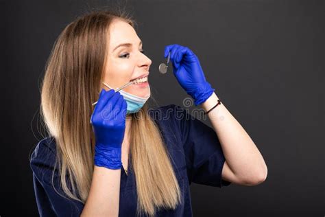 beautiful female dentist using tools wearing scrubs stock image image of care mouth 116249997