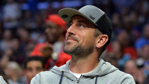 Green bay quarterback aaron rodgers nearly found his teammate in olivia munn, then danica patrick. Aaron Rodgers, Packers QB, meets Dalai Lama on India trip