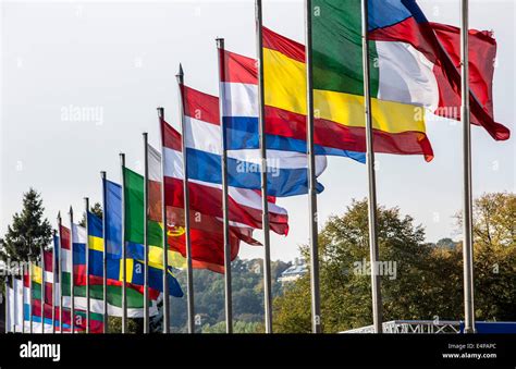 Flag Poles With Flags Of Various European Countries Stock Photo
