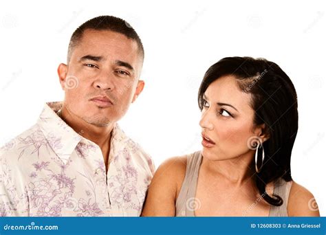 hispanic wife looks suspiciously at her husband stock image image of emotion goatte 12608303