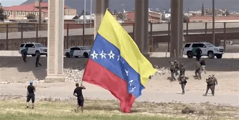 Illegal Migrants Attack Cbp Agents While Waving Huge Venezuelan Flag
