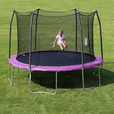 Skywalker 12 Ft Round Purple Backyard Trampoline With Enclosure In The