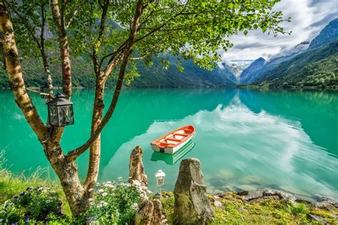 Boat On A Turquoise Lake Hd Wallpaper Background Image 2048x1365