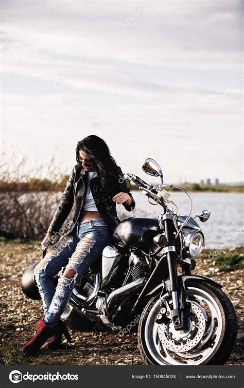 Beautiful Motorcycle Brunette Woman With A Classic Motorcycle C Stock