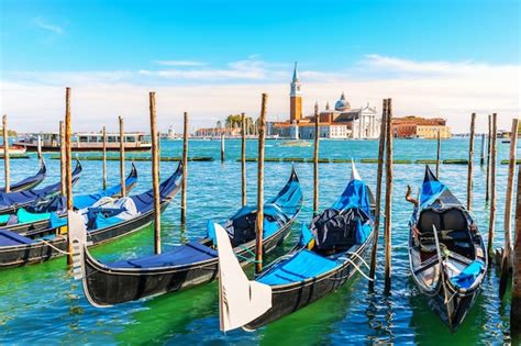 Premium Photo Gondolas Moored In The Lagoon Of Venice Not Far From
