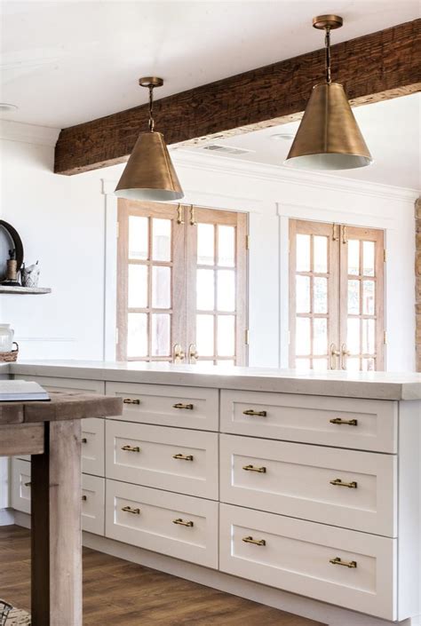 We love how much more bright and light our kitchen is without the faux beams we had originally. Classic Brass Cabinet Hardware from The Home Depot ...