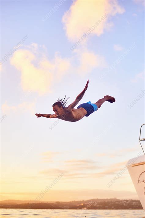 Young Man Diving Into Ocean Stock Image F0225544 Science Photo