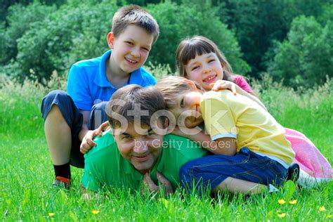 Children Playing With Uncle Stock Photo Royalty Free Freeimages