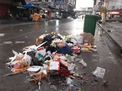 Heaps Of Garbage Dot Streets Of Metro Manila Following The New Year